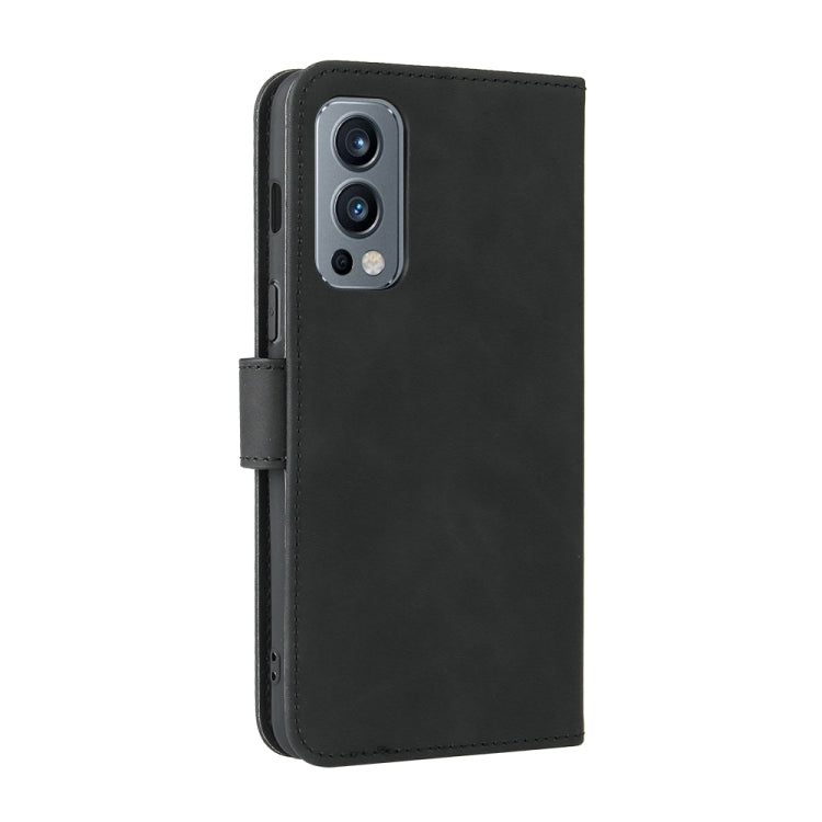 For OnePlus Nord 2 5G Solid Color Skin Feel Magnetic Buckle Horizontal Flip Calf Texture PU Leather Case with Holder & Card Slots & Wallet(Black) - OnePlus Cases by buy2fix | Online Shopping UK | buy2fix